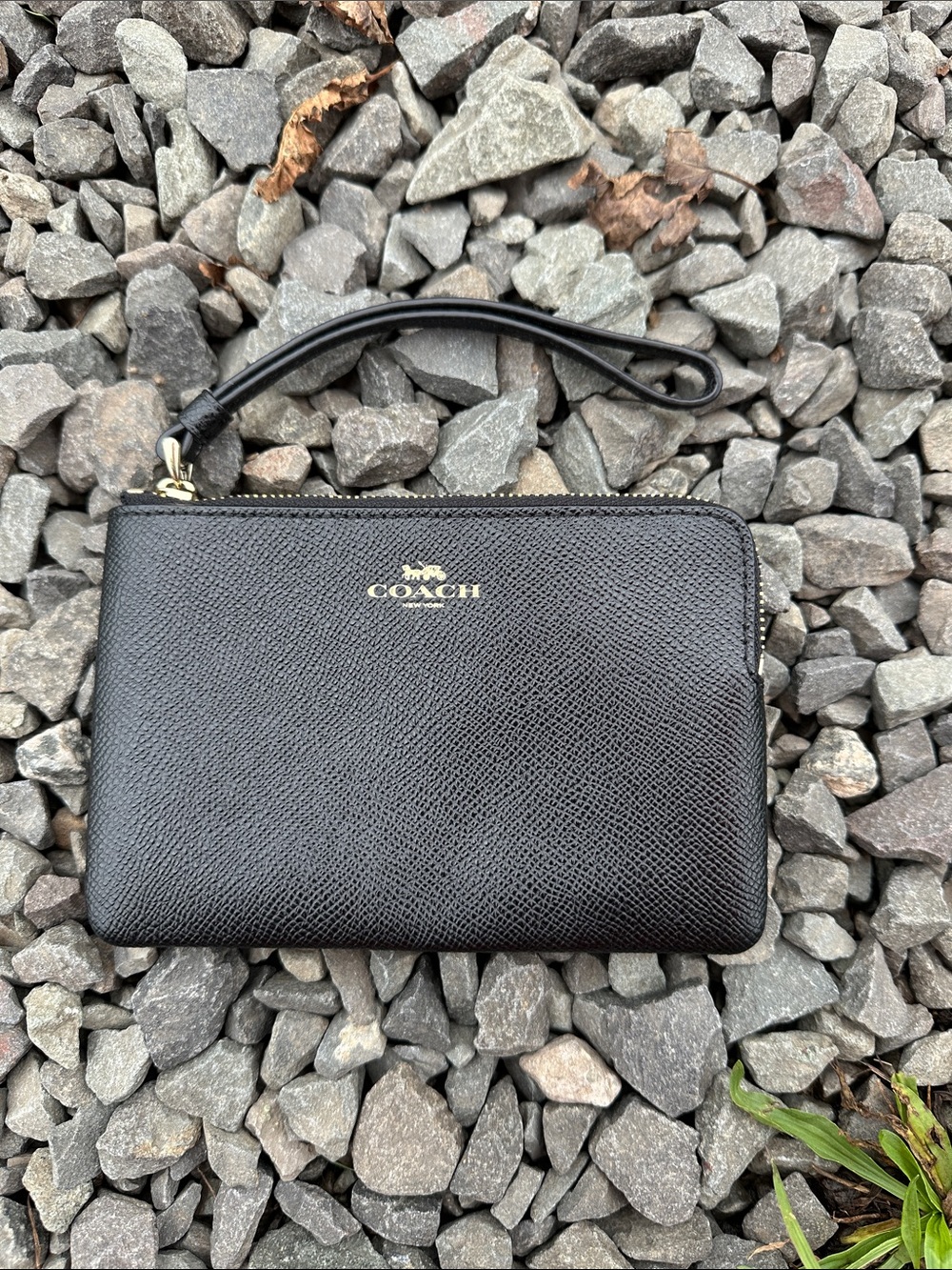 COACH Black Pebbled Leather Zip Wristlet with Gold Logo